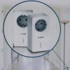 Adaptor de retea D-Link PowerLine AV2 1000 HD Gigabit Passthrough